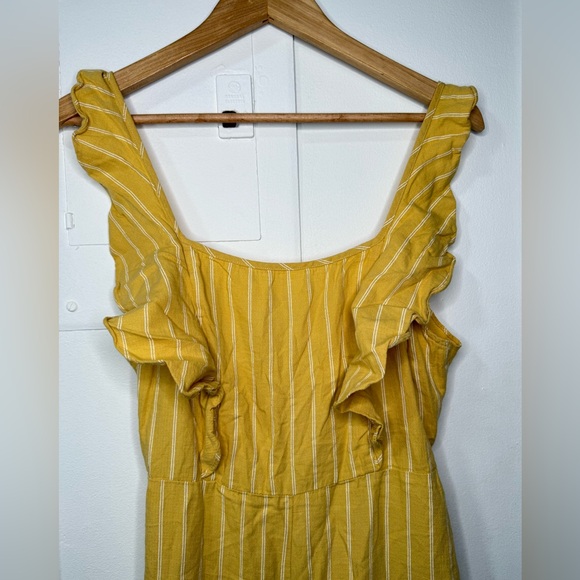 Yellow pinstripe tie back jumpsuit with front ruffle & adjustable straps. Size M - Picture 8 of 8